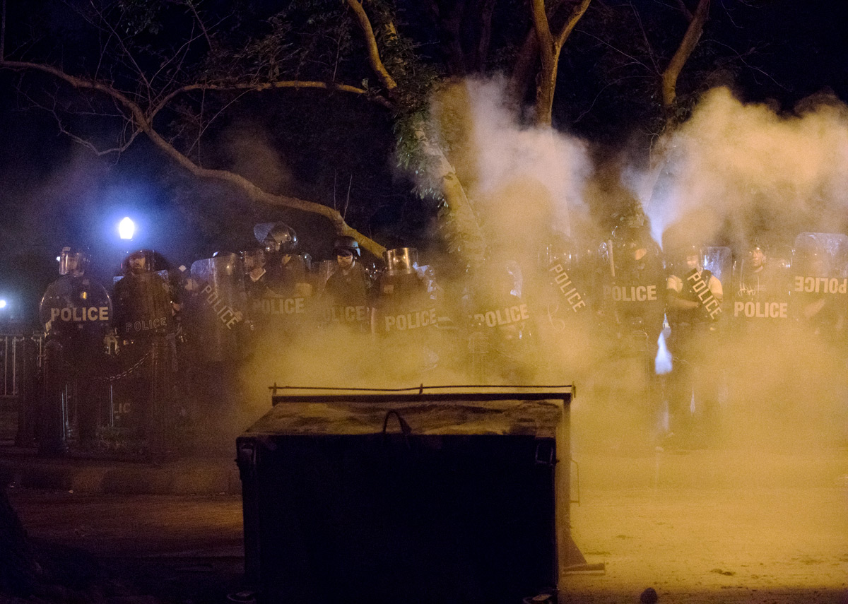 The death of George Floyd in Minneapolis ignited protests around the country including near the White House for a second night, in Washington, D.C., on Saturday, May 30, 2020. Floyd, a black man, died when a white police officer held his knee on the man's neck during an arrest. Protesters broke store windows, set garbage bins on fire and threw water bottles at law enforcement who shot tear gas, fireworks and used pepper spray against the crowds.