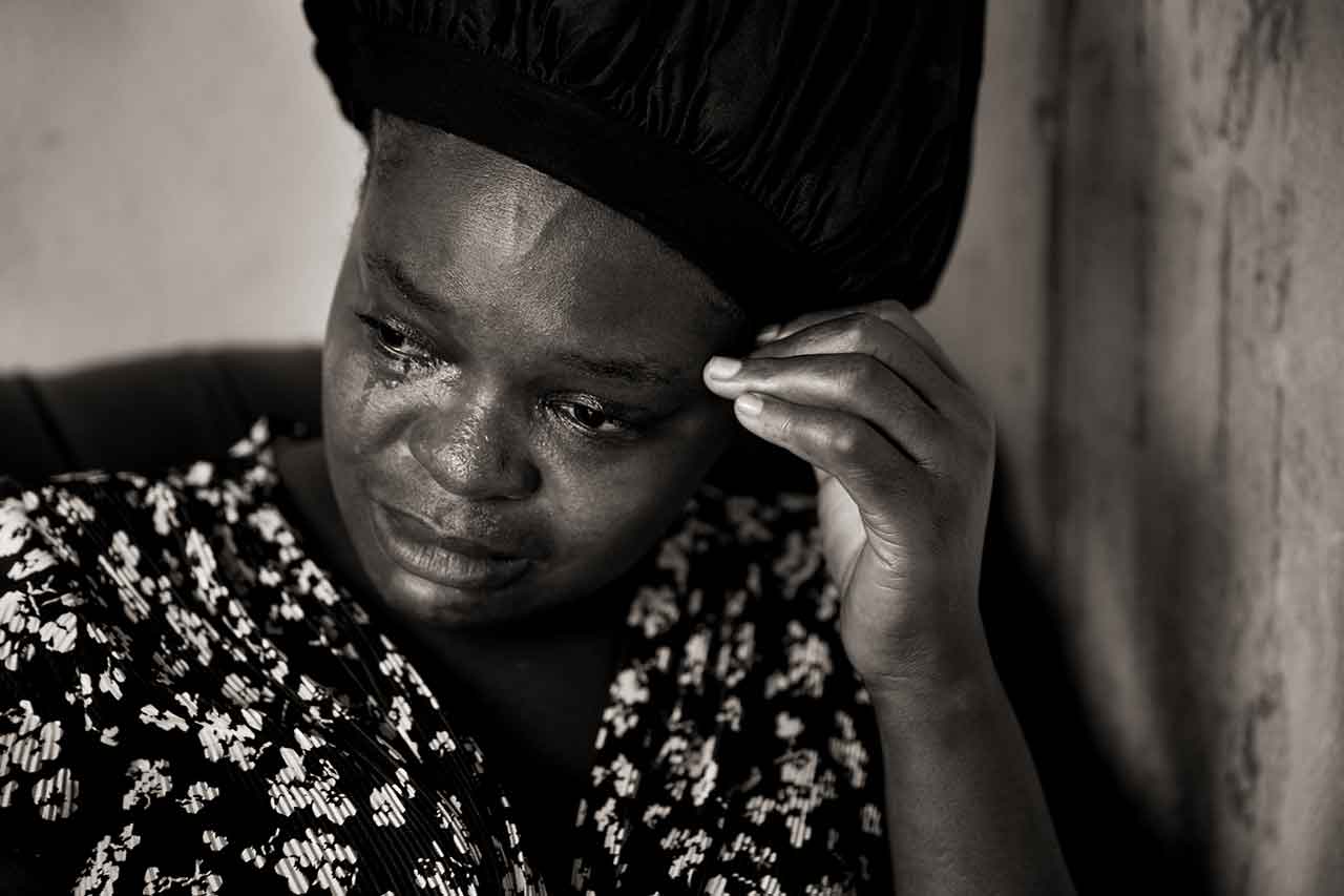 Evacuee Sherrine Petit Homme LaFrance weeps as she recounts how her relatives who live in Nassau turned their backs on helping her after her home was decimated by Hurricane Dorian, in Nassau, Bahamas, on Oct. 3, 2019. Petit Homme LaFrance had just moved in to her newly constructed house in Treasure Cay on Abaco the day before the storm hit, only to see it decimated by Dorian the same night.